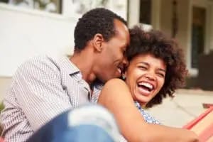 A couple talking and laughing, expressing their love through quality time