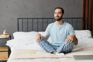 A person meditating in a peaceful environment