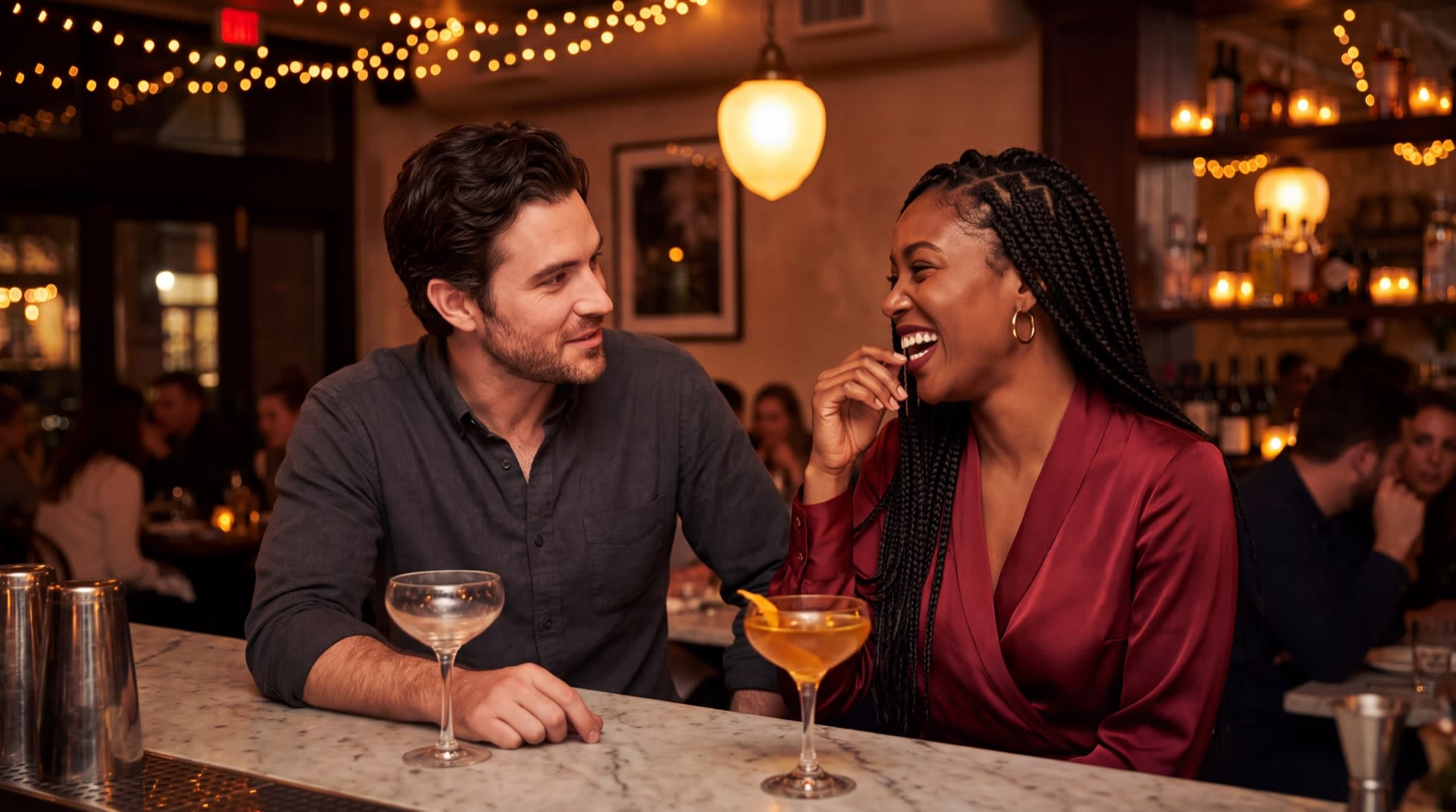 Two people on a first date at a warmly lit bar, leaning in with intense mutual chemistry.