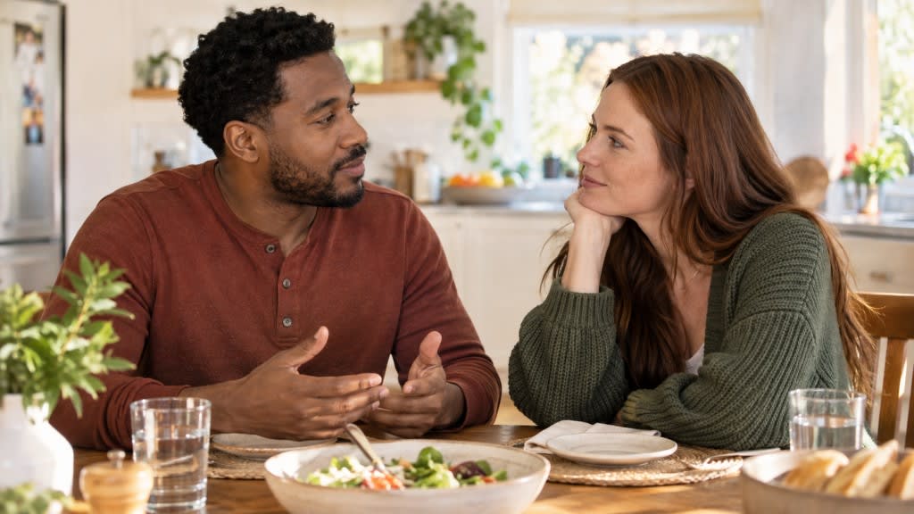 Couple talking over dinner, showing family support for misophonia symptoms and relationship strain