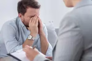 A person with OCD and OCPD talking to a mental health professional