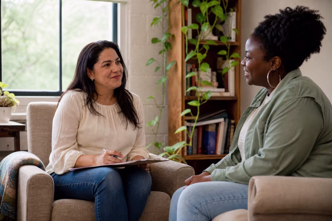 Uplifting EMDR therapy session in San Francisco with a warm trauma-informed therapist and hopeful client