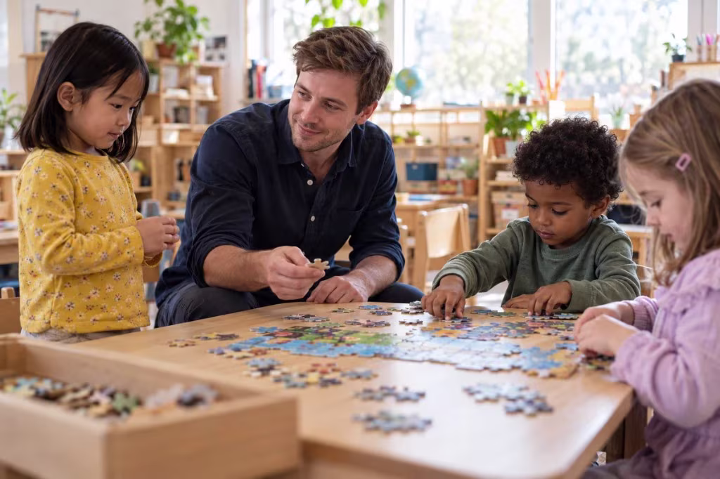 An adult and three children work on a puzzle in a classroom, nature and nurture in child development