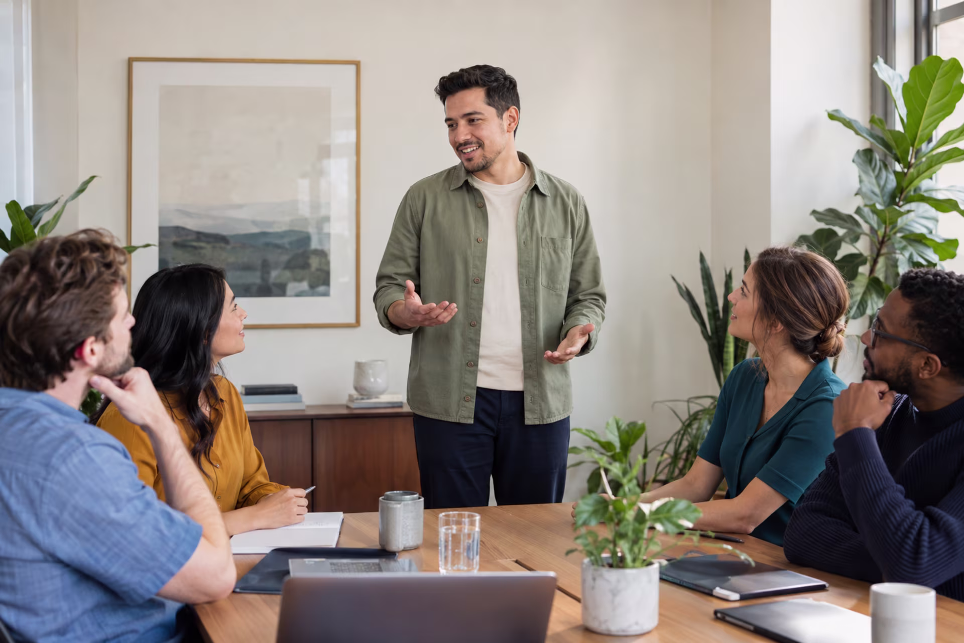 Body language and eye contact during a small-group presentation at a team meeting