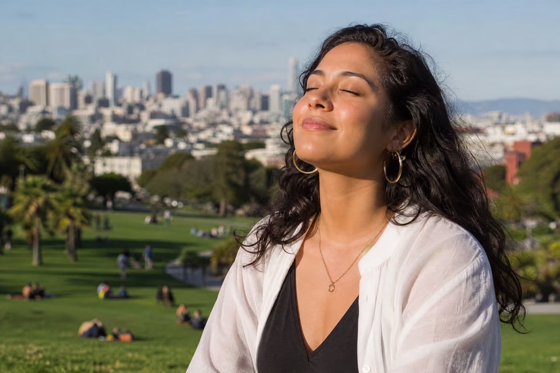 Woman at peace in Dolores Park after therapy for depression