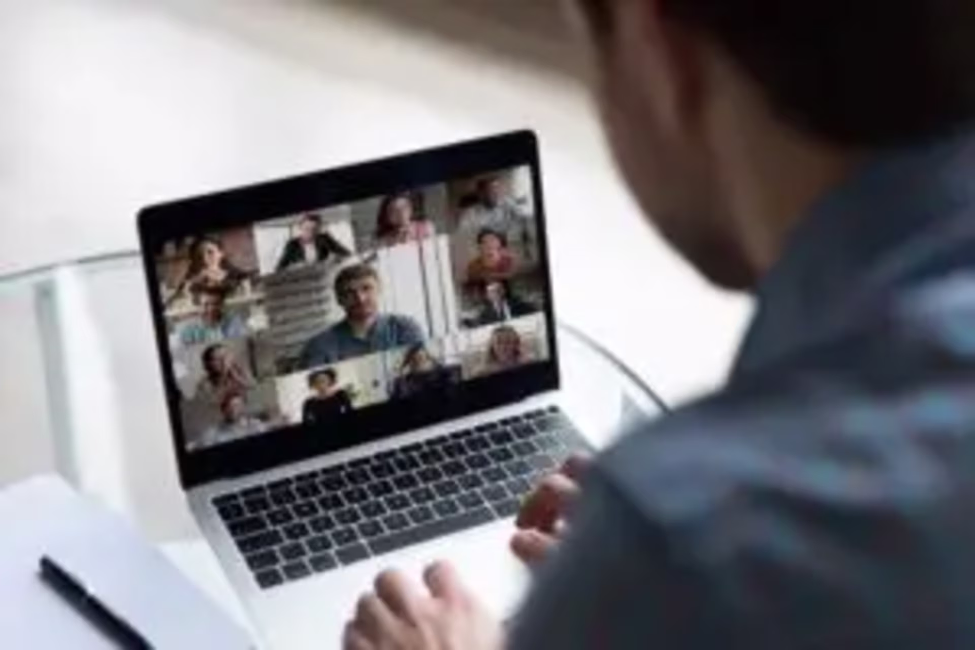 a man doing telemedicine group therapy in sf california 