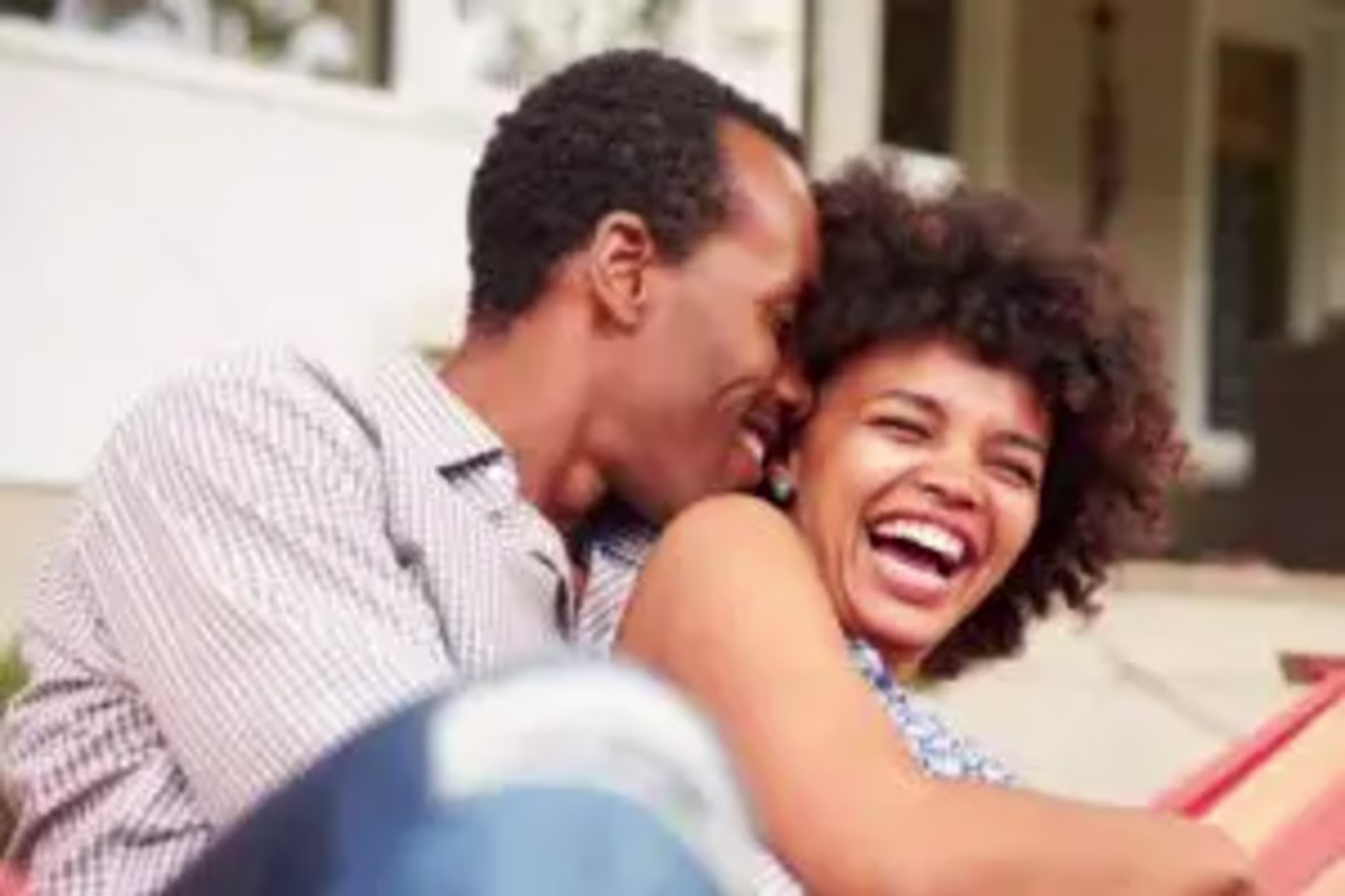 A couple talking and laughing, expressing their love through quality time