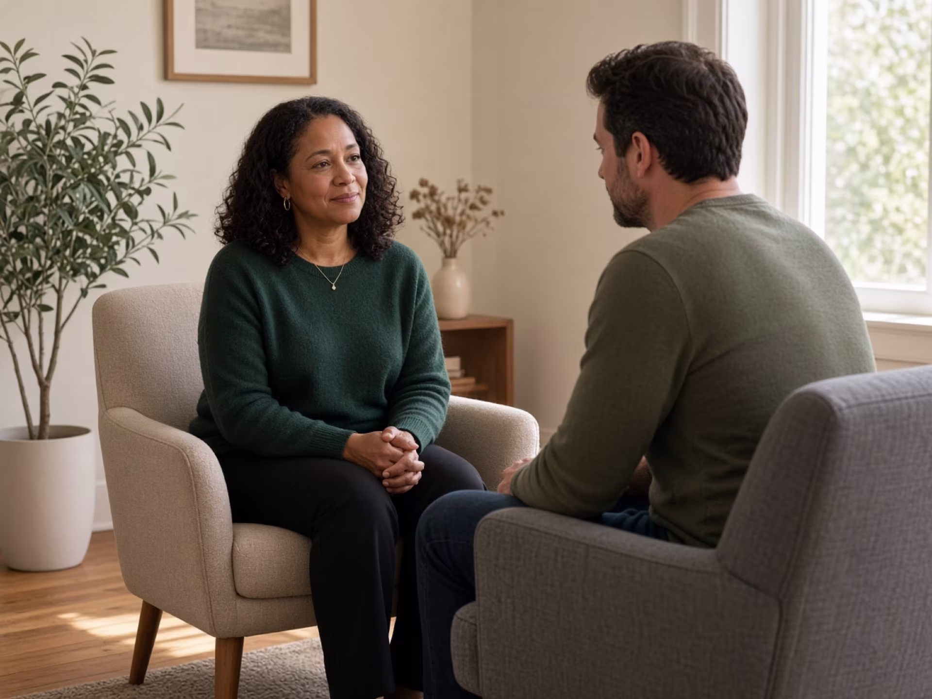 Grief counseling session in an Oakland therapy office