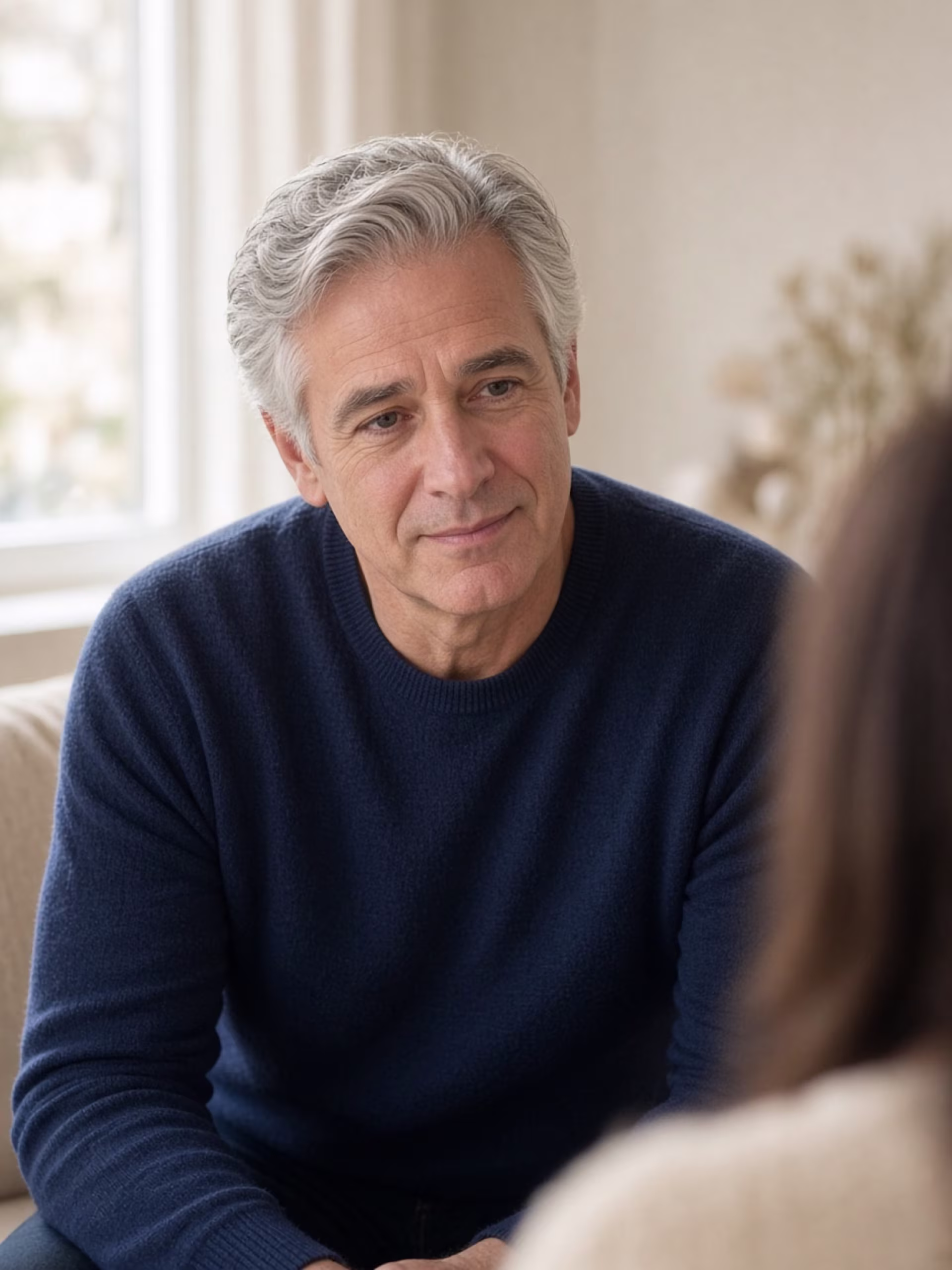 Grief therapist listening during a session