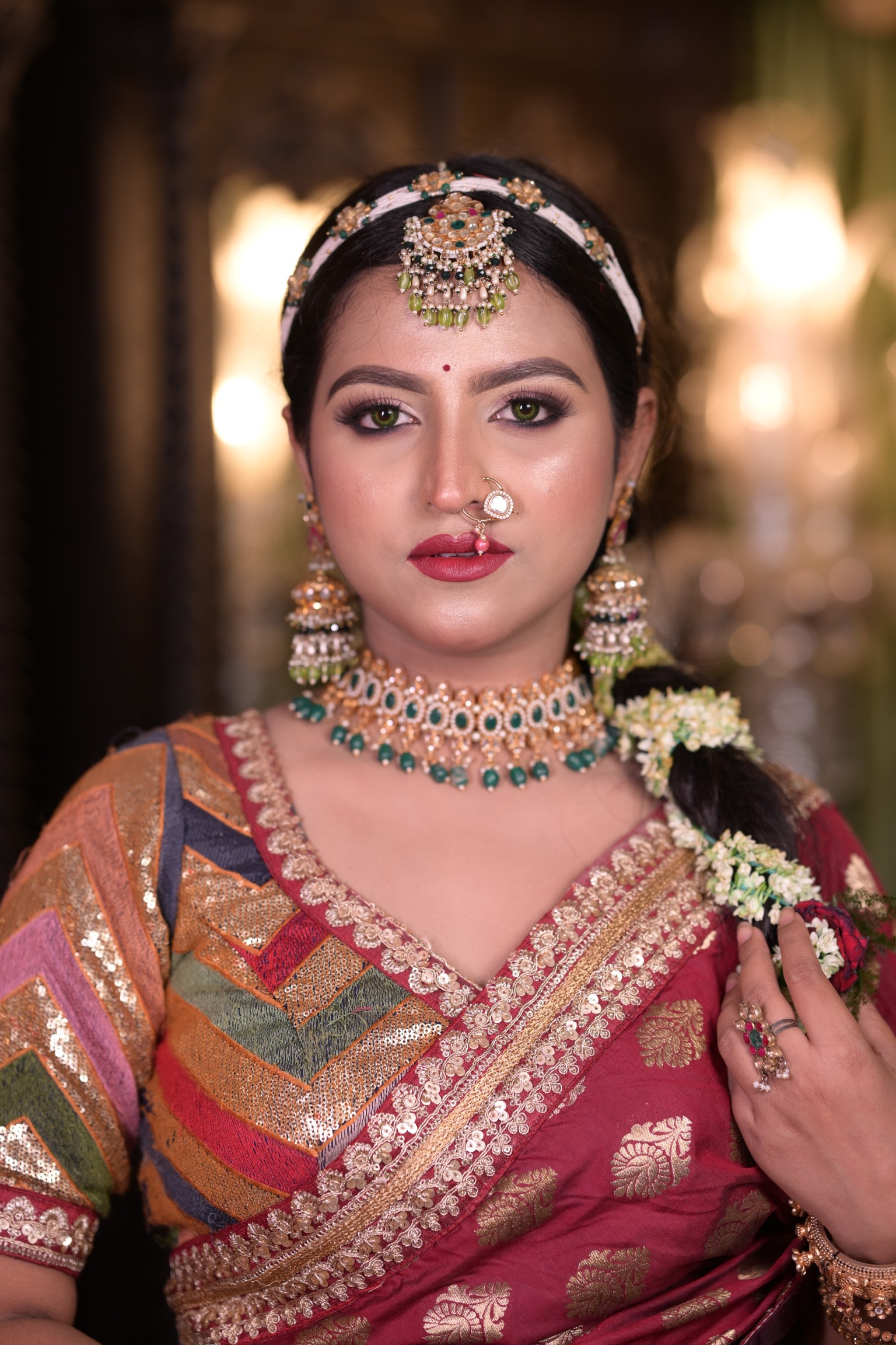 Stunning Indian Bridal Makeup with traditional jewelry and gajra.