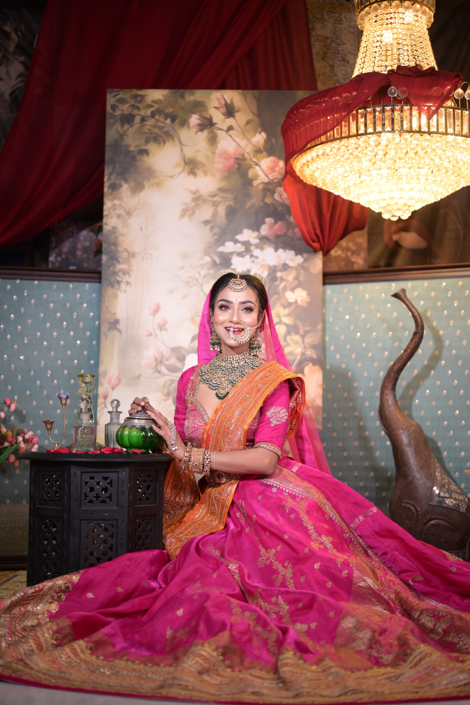 Traditional Indian bridal makeup with exquisite jewelry and draping