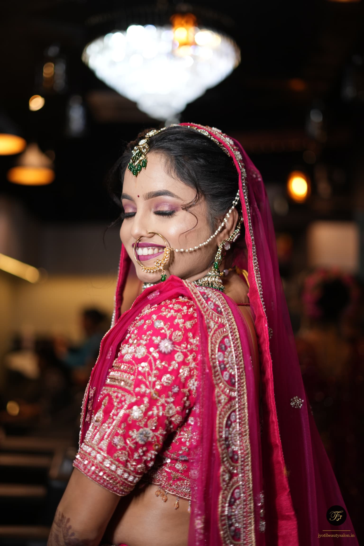 Bridal shimmery mauve eye makeup and traditional gold nath by Jyoti Beauty Salon in Chapra Bihar