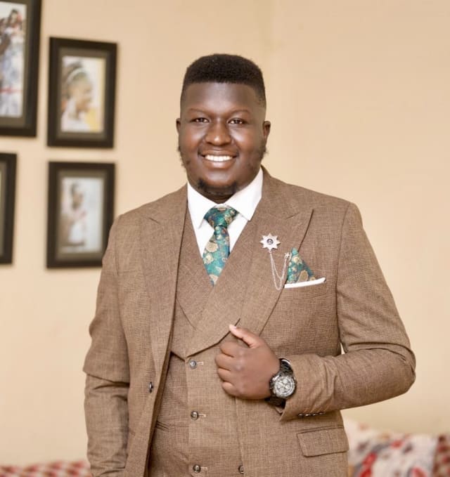 Dr Otim Moses Cooper