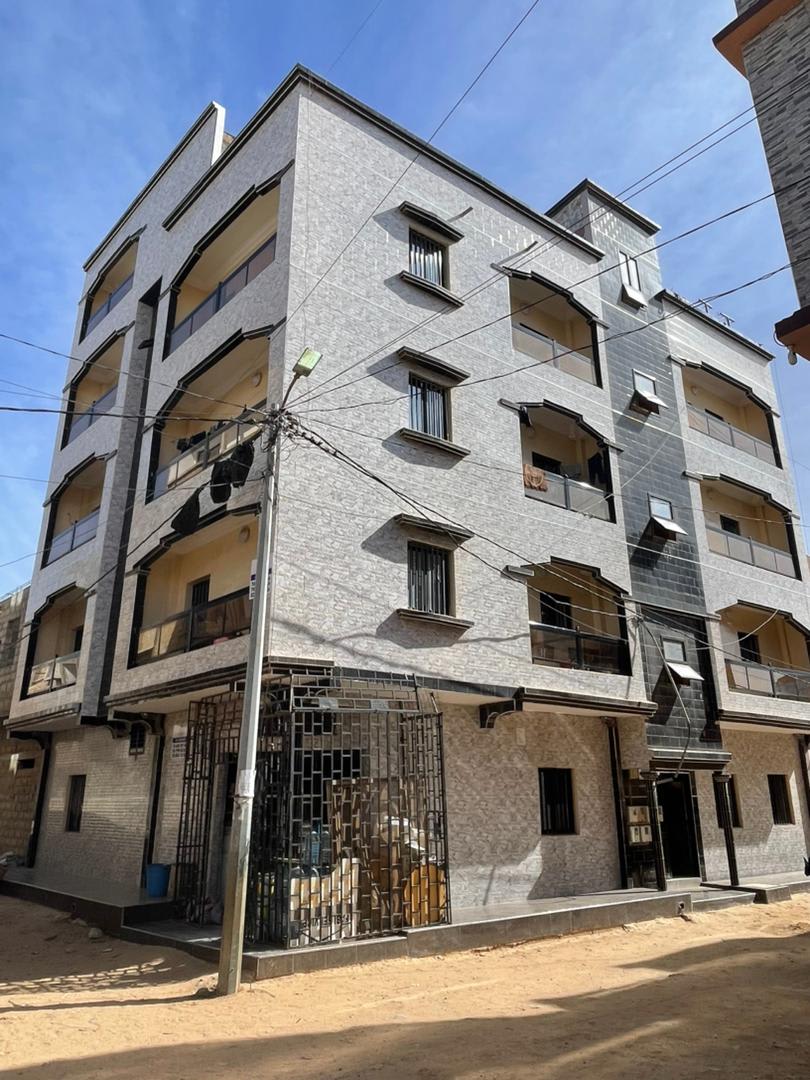 Immeuble R+4 Neuf à Zac Mbao - Déjà loué
