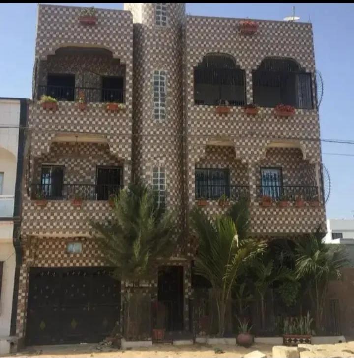 Maison R+2 180m² à Vendre Keur Massar - 9 Chambres + 6 SDB | Quartier Résidentiel | Bail | 90M FCFA