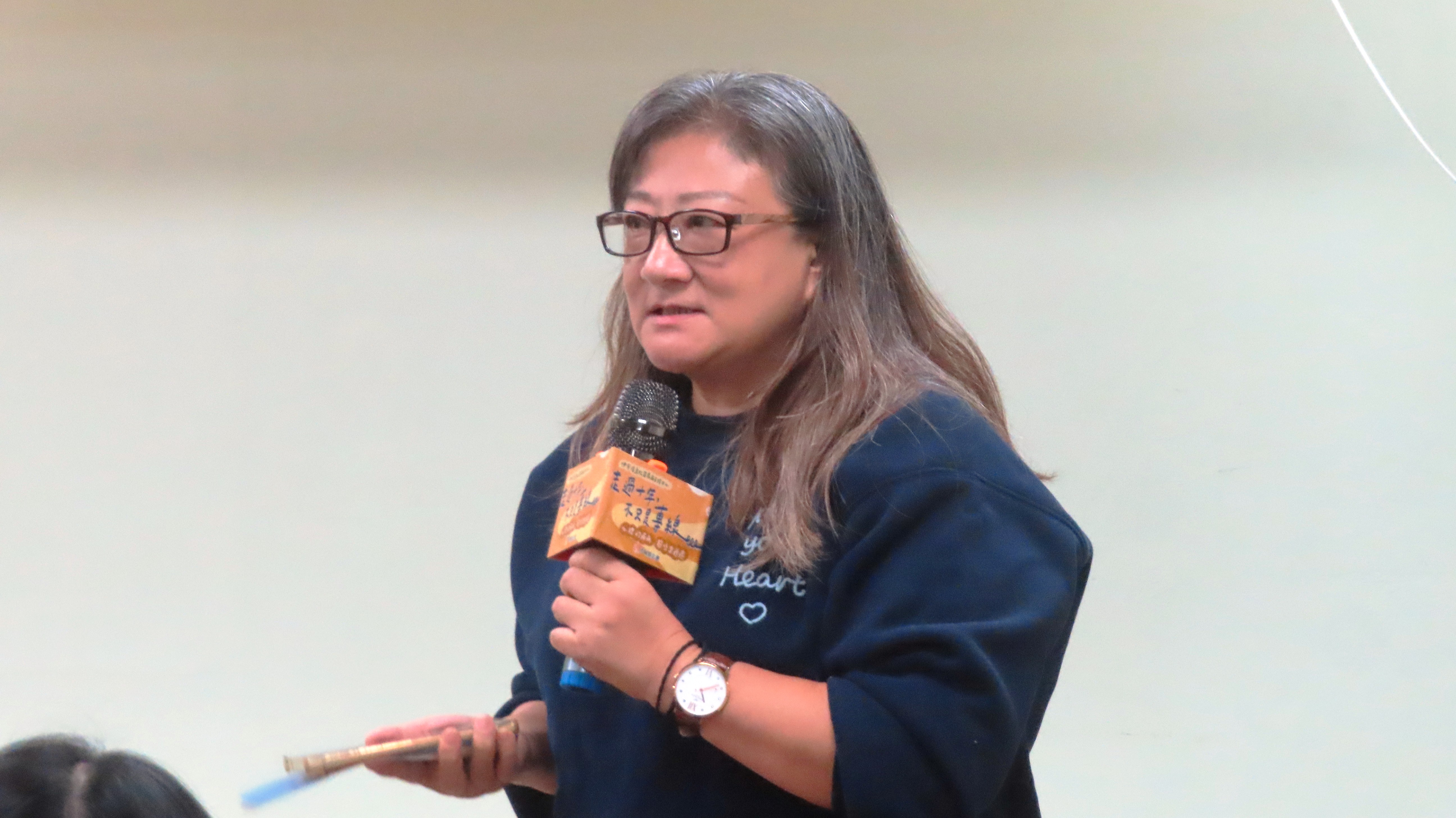 從受助者成為助人者的繆珮清。（圖/梁敬彥攝影）