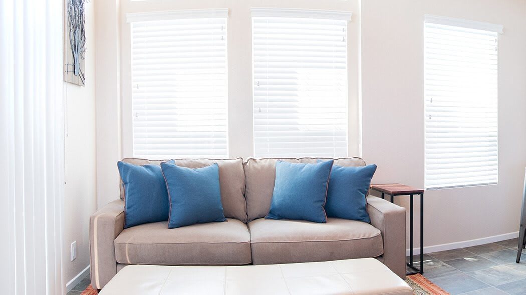 Panorama of 1 bedroom cottage interior showing living area