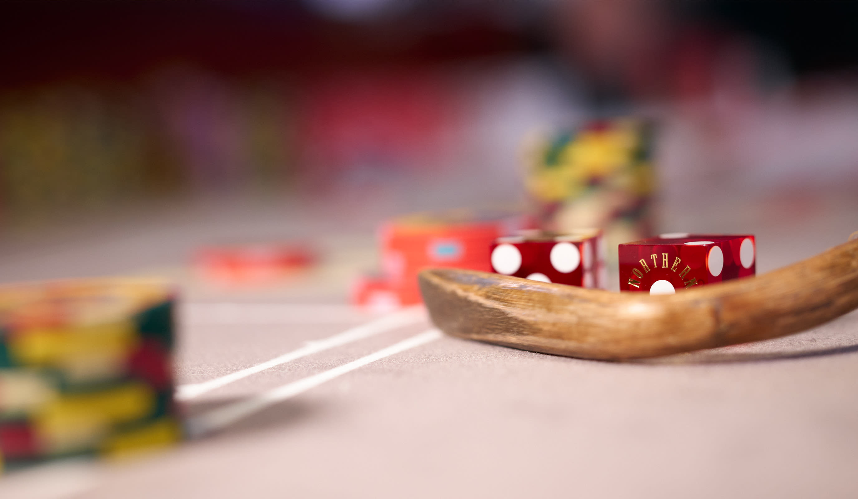 A lady playing craps