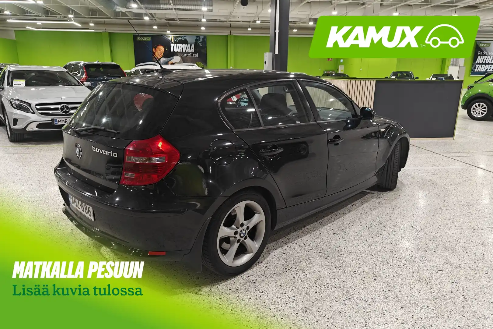 BMW 118 E87 Hatchback 5-ov Business 2009, photo 5/12
