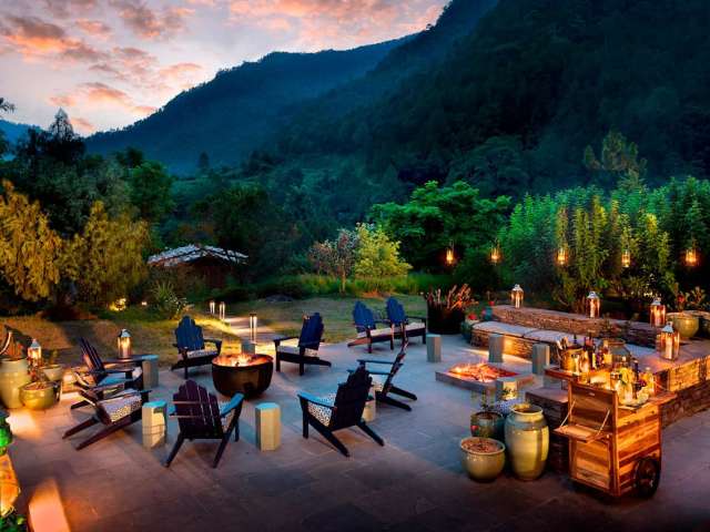 Punakha river lodge but o guest area fire pit
