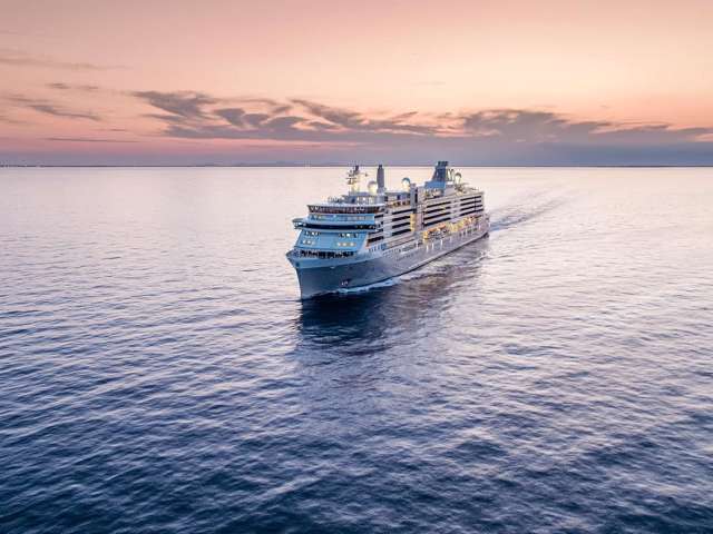 Silver ray ship exterior sunset
