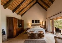 Kapama southern camp standard suite quarto e terraco