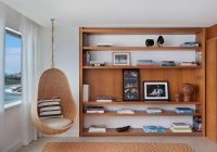 Janeiro hotel suite janeiro area de descanso com estante de livros