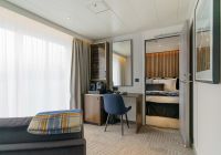 Quark expedition ultramarine owner s suite sala estar