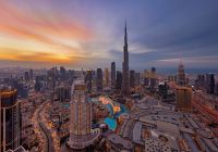 Det visit dubai burj khalifa e fonte anoitecer