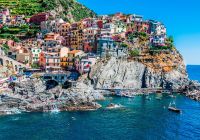 Village of manarola with ferry cinque terre