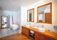 Amilla maldives lagoon water pool villa banheiro