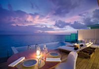 Amilla maldives sunset water pool villa deck