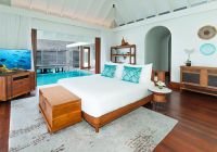Anantara kihavah maldives villas overwater pool villas quarto