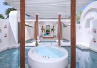 Anantara kihavah villas banheiro beach pool villa