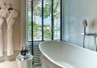 Hard rock hotel maldives platinum overwater pool bathroom
