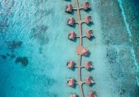 Intercontinental maldives overwater pool villas vista aerea