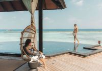 Sun siyam irufushi maldivas couple beach