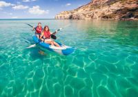 Viagem Ilhas Maldivas casal caiaque praia