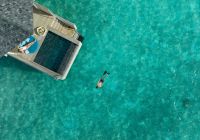 Water villa with pool aerial raaya by athosphere