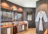 Le tikehau by pearl resorts banheiro premium overwater bangalo