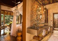 Zuri zanzibar bungalow quarto e banheiro