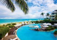 Piscina e praia Grace Bay, The Palms Turks and Caicos
