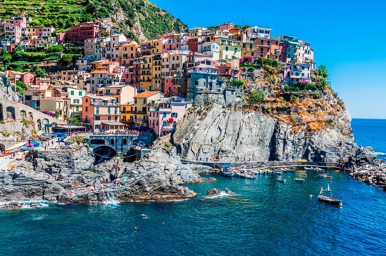 Village of manarola with ferry cinque terre
