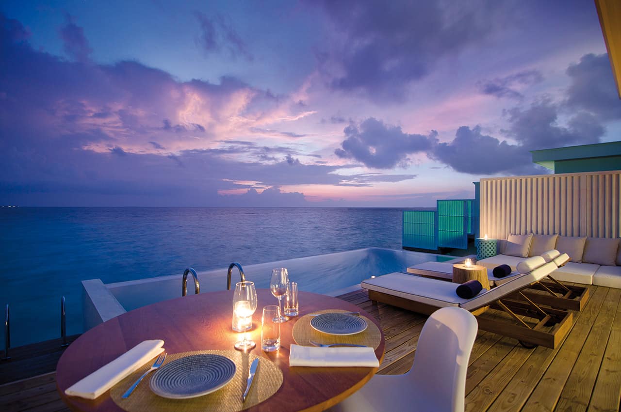 Amilla maldives sunset water pool villa deck