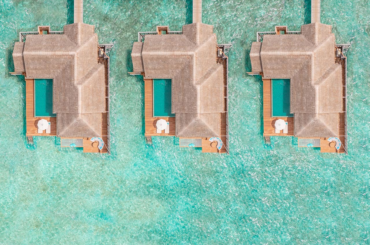 Anantara kihavah maldives villas overwater pool villas vista aerea