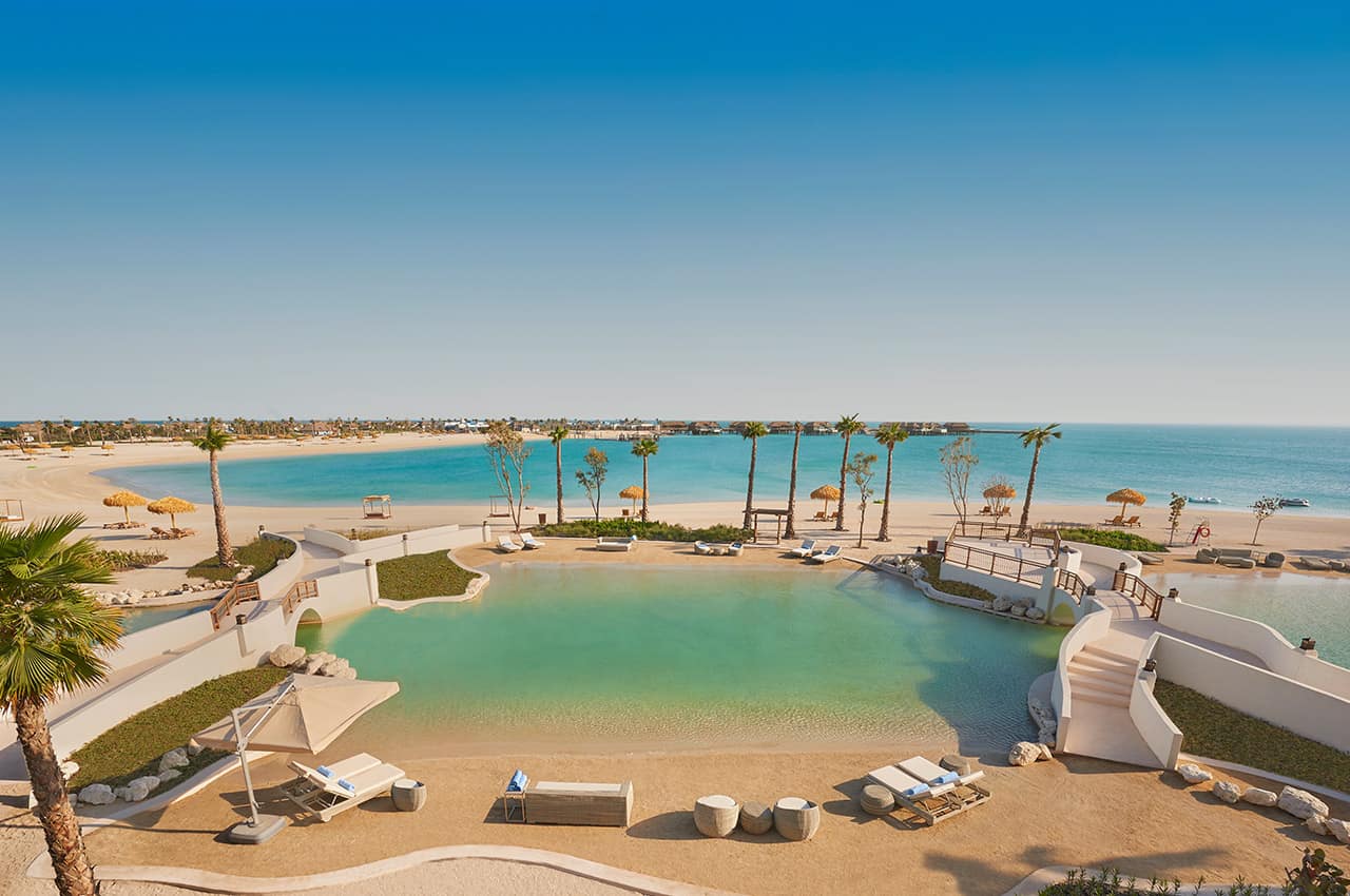 Banana island resort doha by anantara lagoon pool