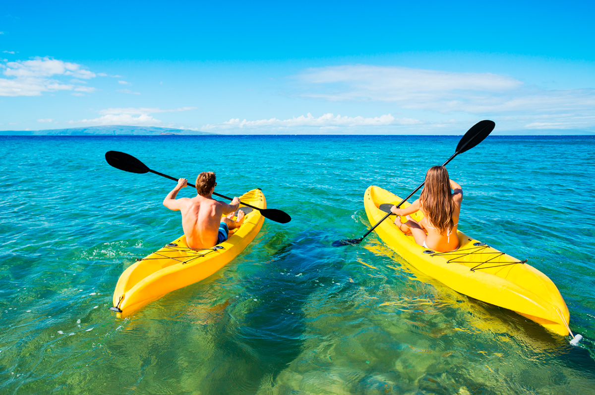 iStock Couple Kayaking in the Ocean on Vacation - shutterstock_231784705