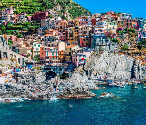 Village of manarola with ferry cinque terre
