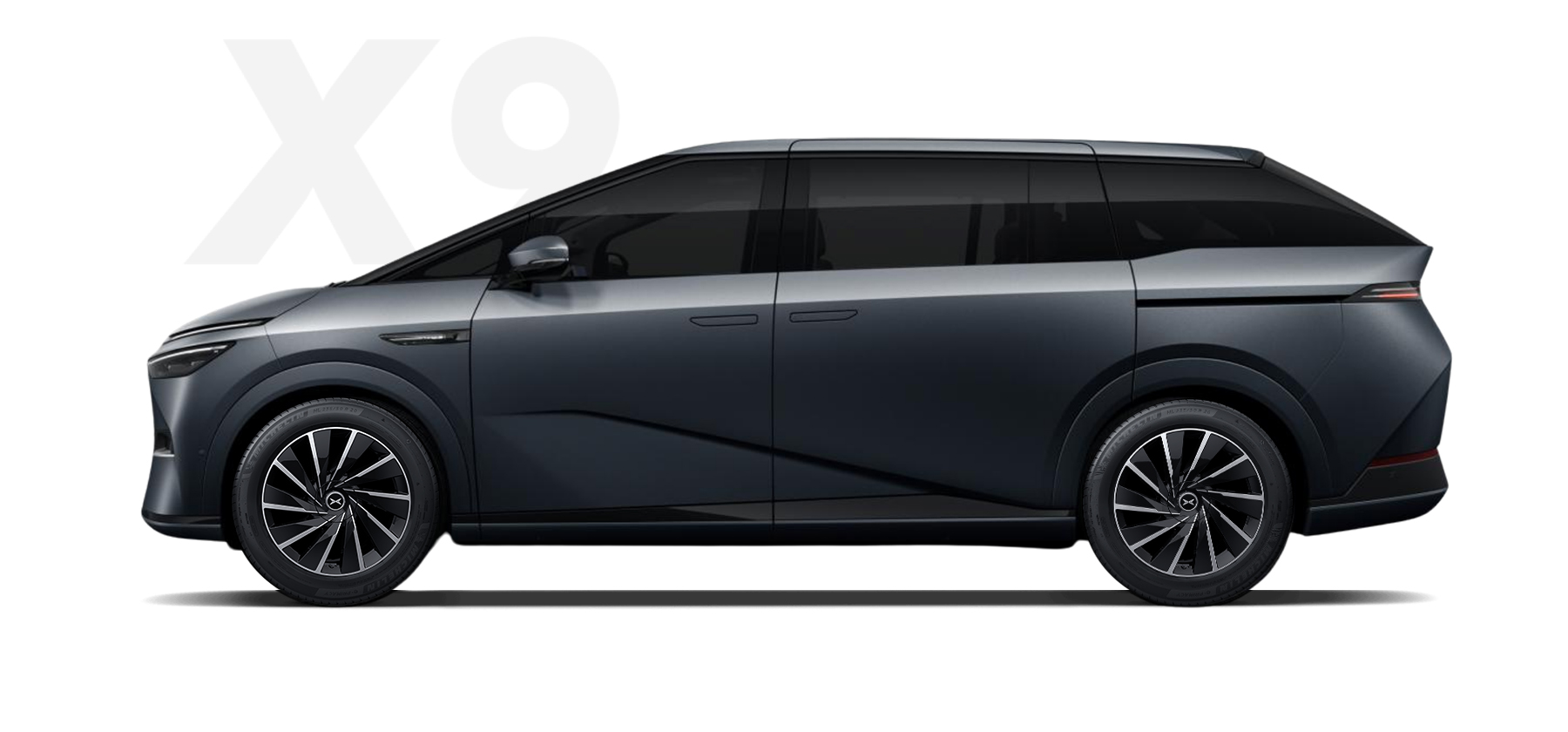 XPENG X9 flagship MPV in graphite gray at city night