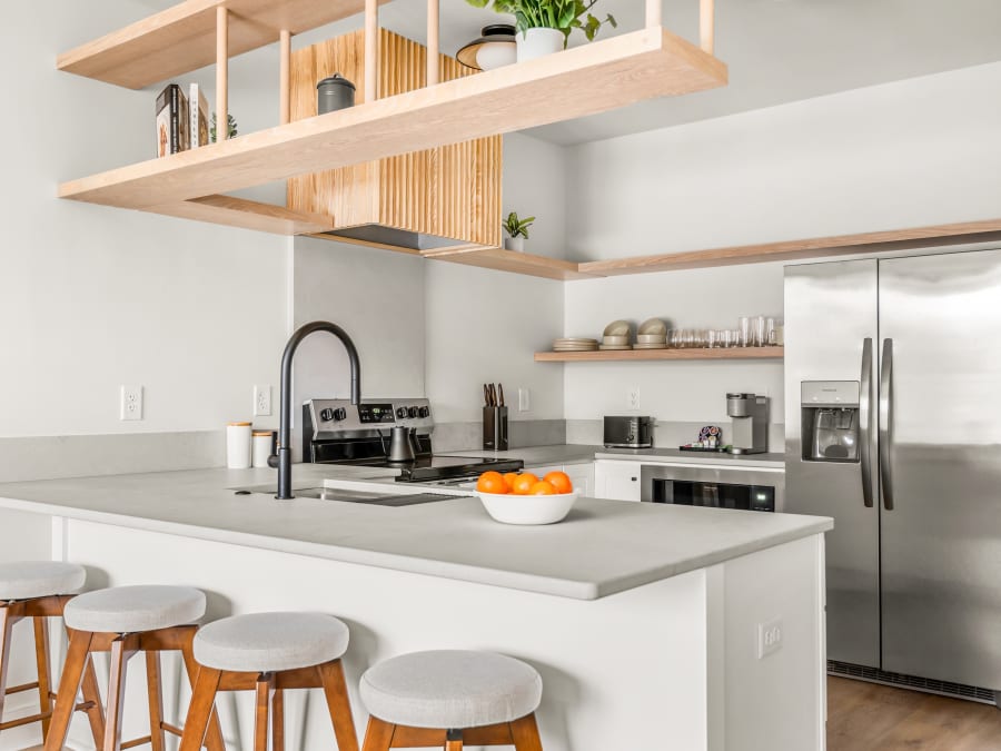 Kitchen with counter seating in a one-bedroom apartment